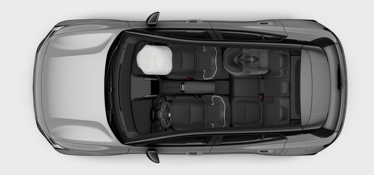 Een weergave van bovenaf van het interieur van de auto met een geactiveerde airbag en kinderzitje achterin.