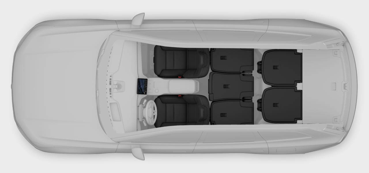 A top-down view of the car with folded rear seats