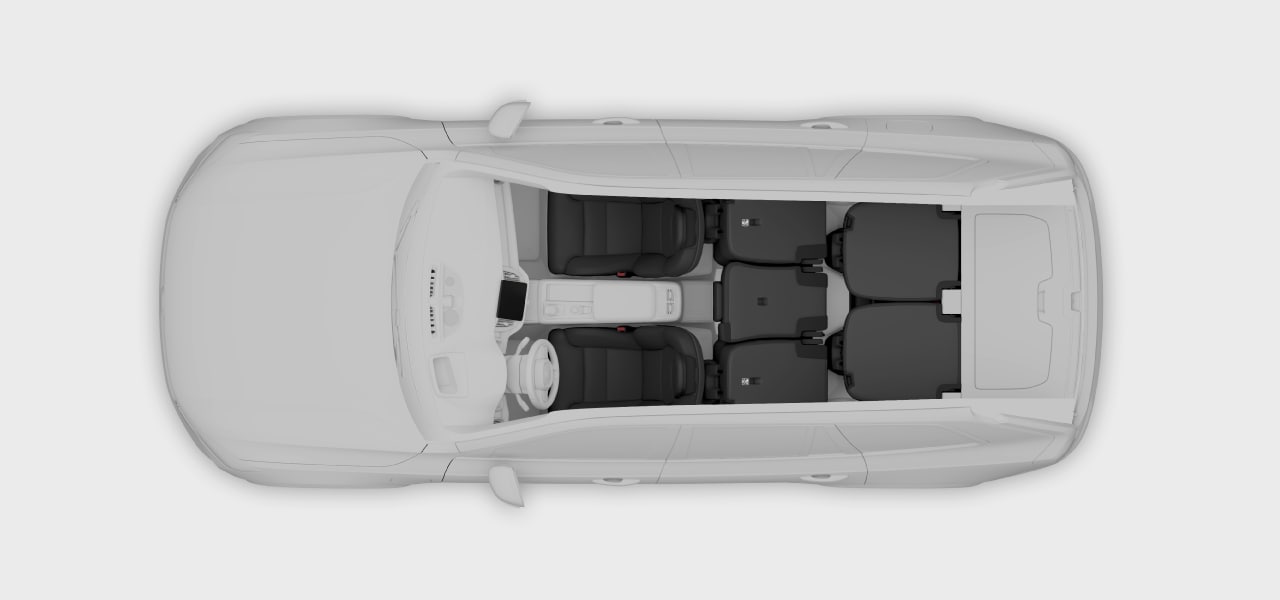 A top-down view of the car with folded rear seats