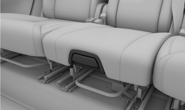 The release handle on the front of the centre seat