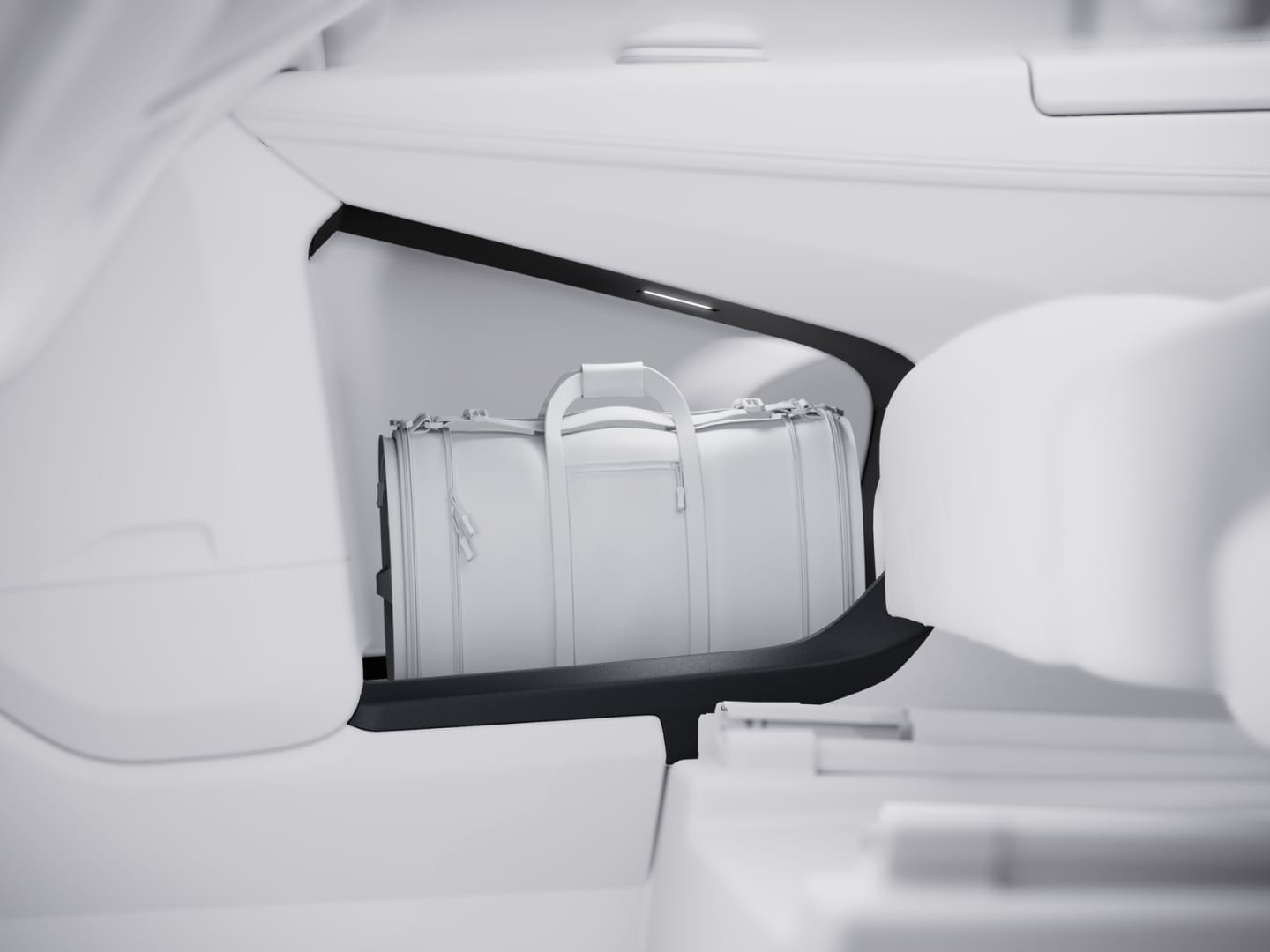 Image of the large storage space carved into the rear passenger door of the Volvo EM90. 