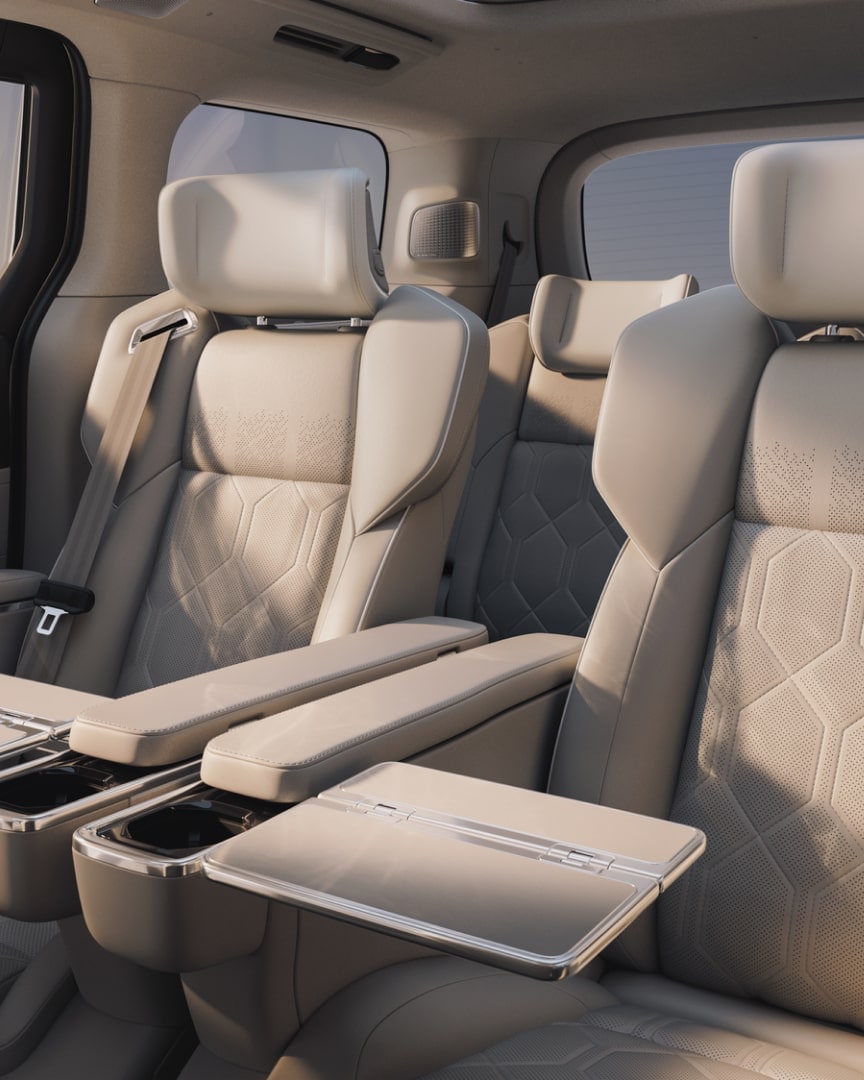 Dappled light falls on the second-row lounge seats featured in the Volvo EM90.