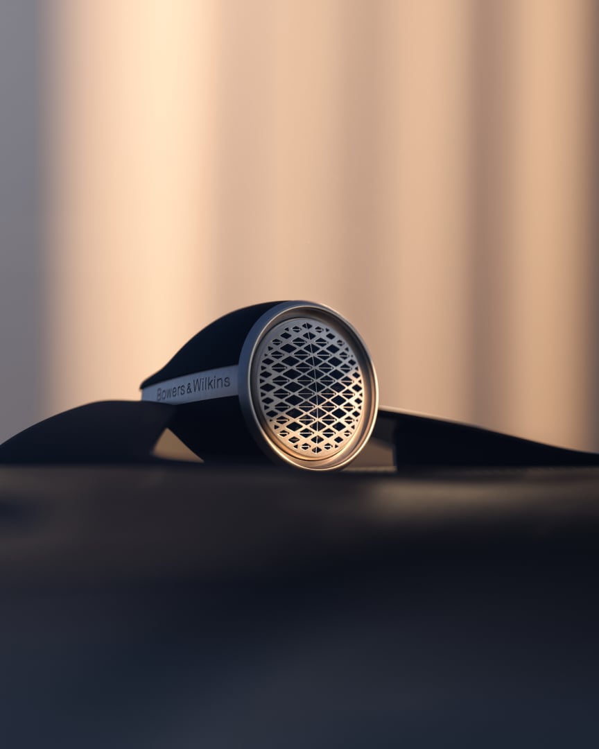Close-up image of one of the 21 Bowers & Wilkins speakers delivering surround sound in the Volvo EM90.