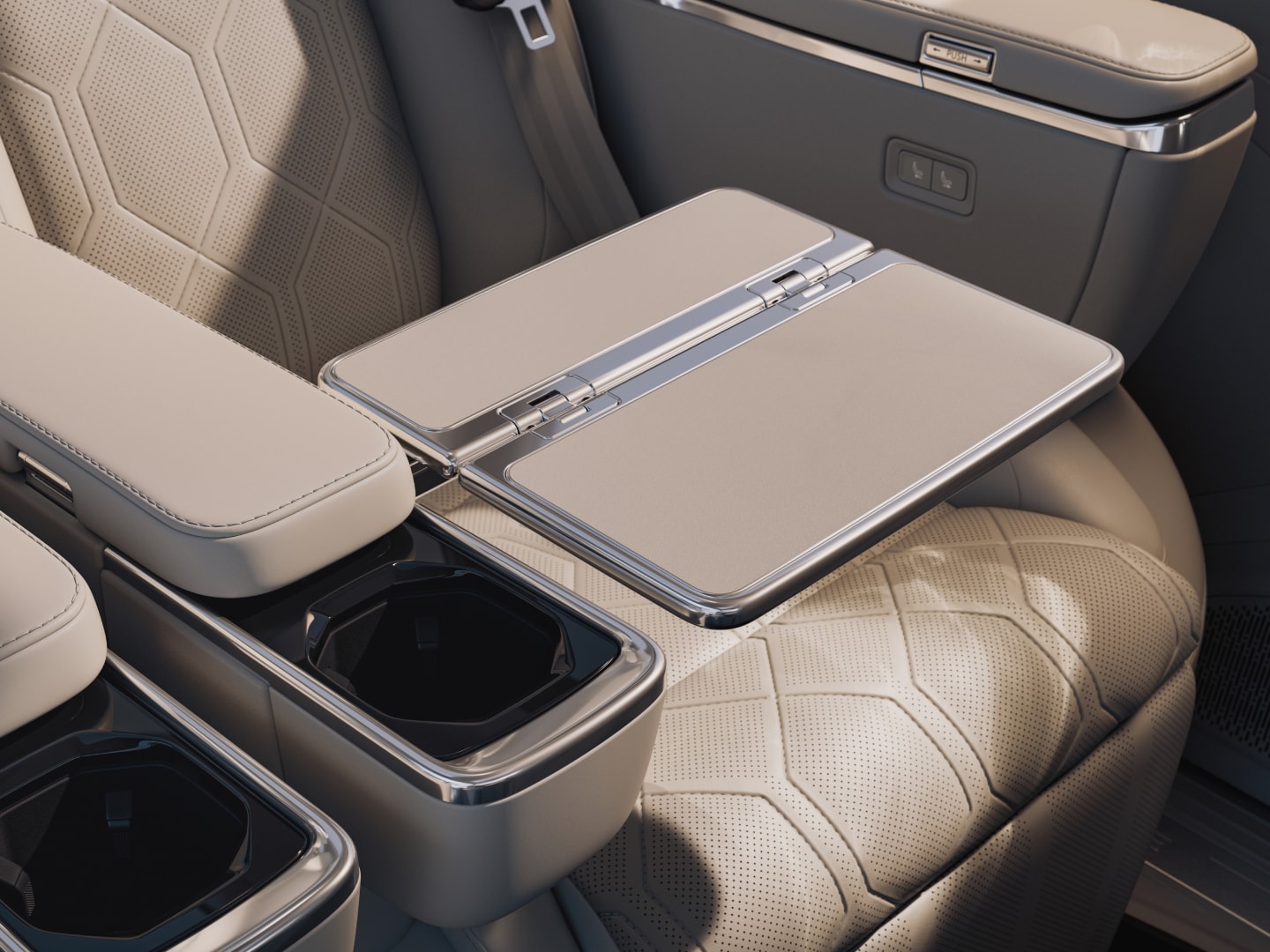 Close-up image of the folding trays and cupholders available in the second-row seats featured in the fully electric EM90.