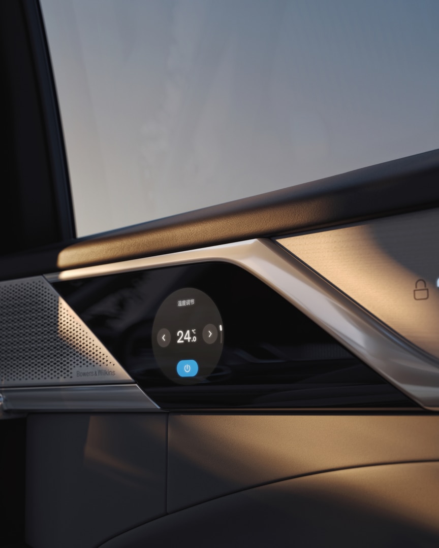 Close-up of the round touchscreen that allows rear passengers to adjust climate settings.
