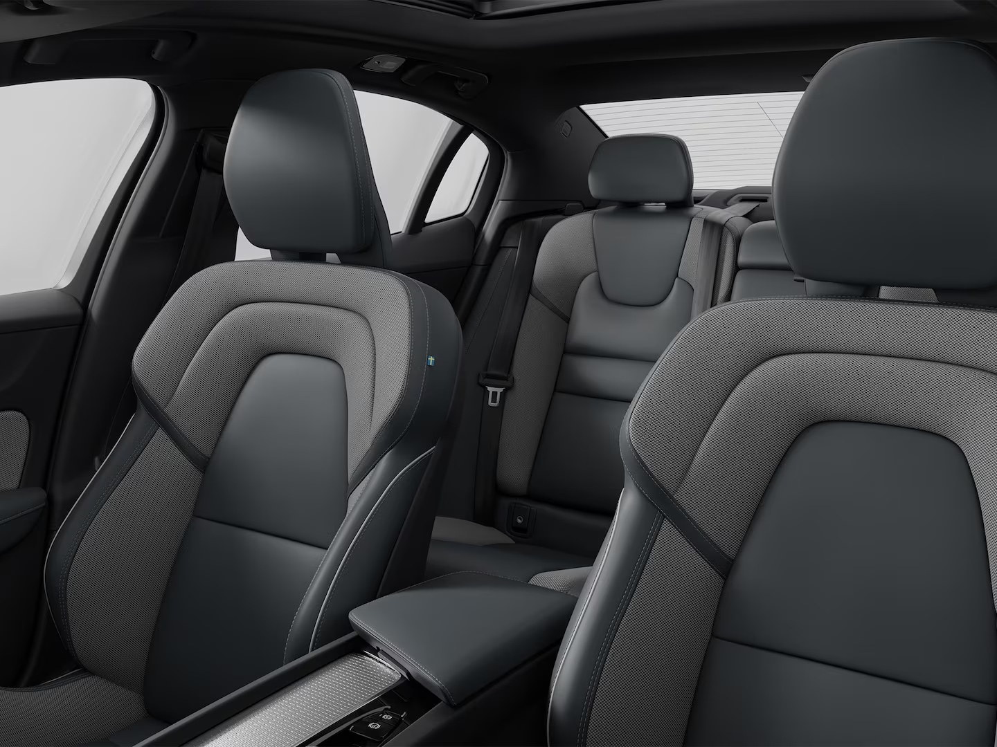 All five dark gray leather and textile seats in the Volvo S60 mild hybrid.