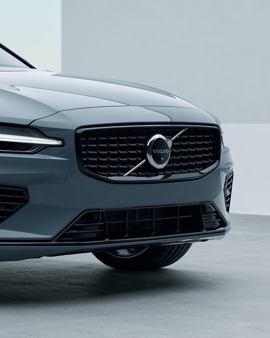 Volvo S60 Recharge plug-in hybrid LED headlamps and side exterior.