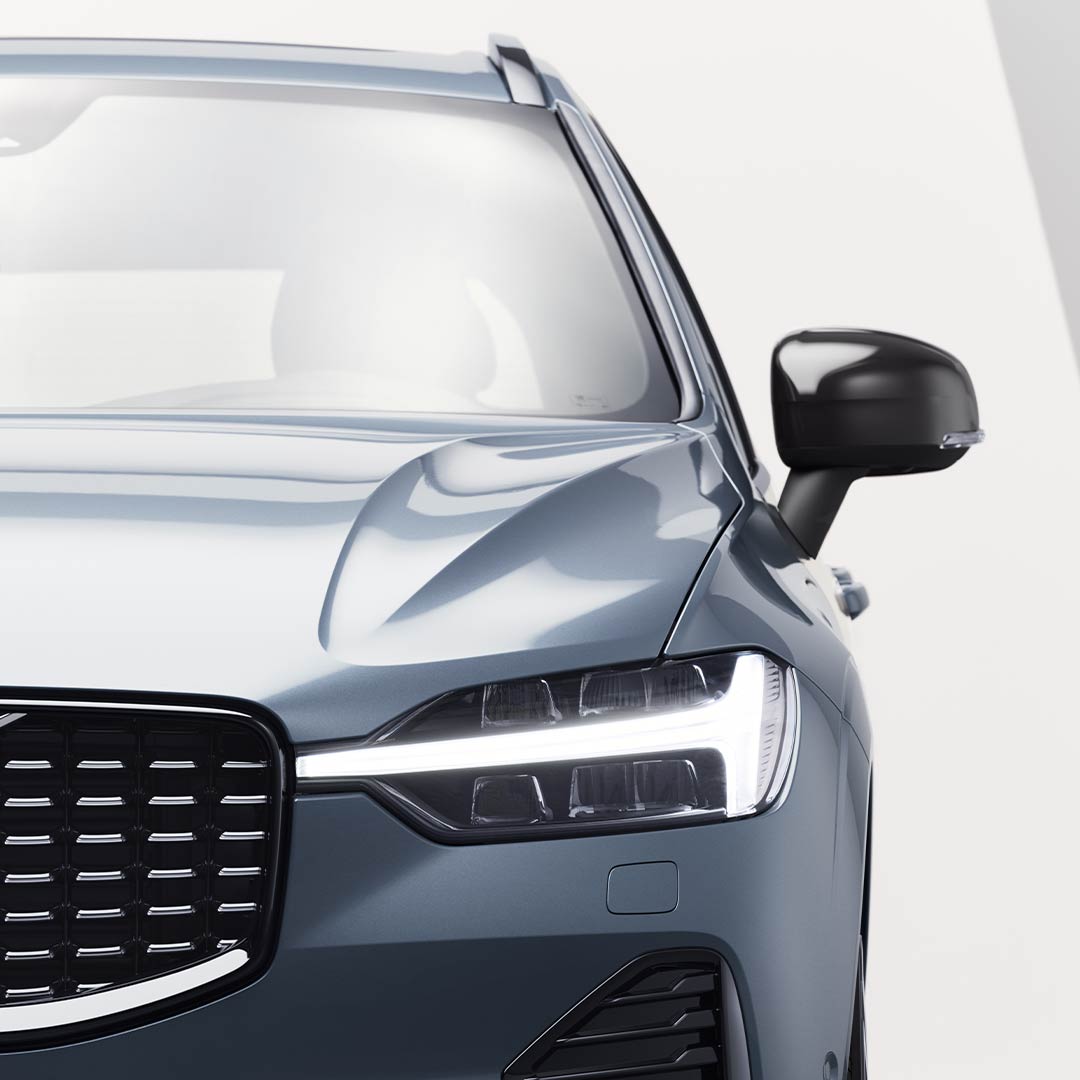 Front exterior of Volvo XC60 Recharge with the iconic front grille and headlamp design.