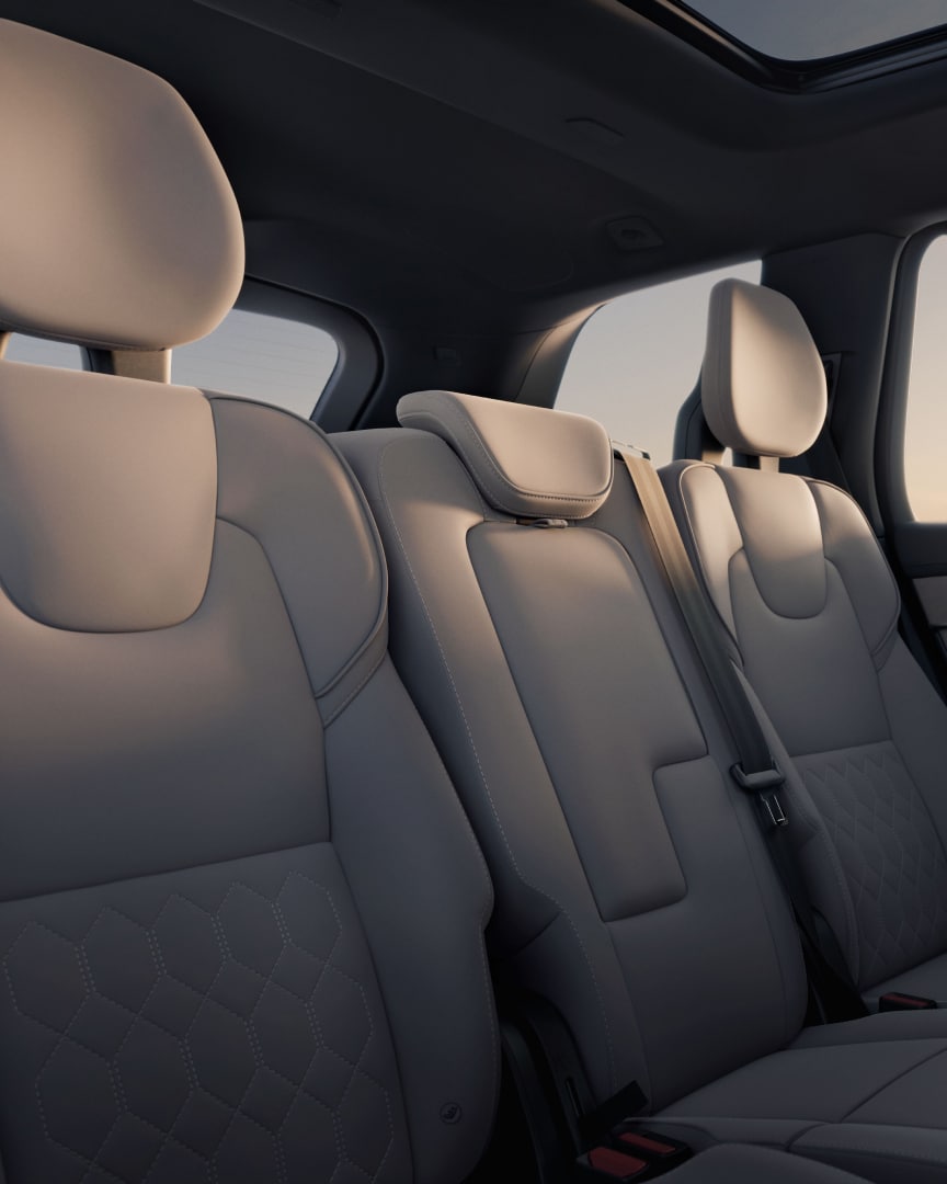 An interior shot of the XC90 hybrid second-row seats in quilted Nordico.