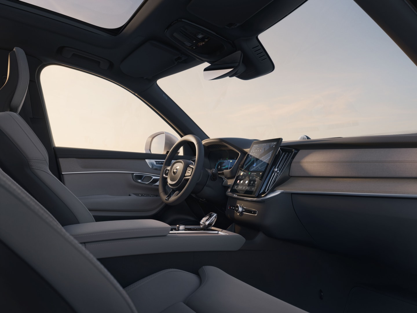 Een binnenaanzicht van het interieur vanaf de passagiersstoel voorin in de XC90 plug-in hybrid.