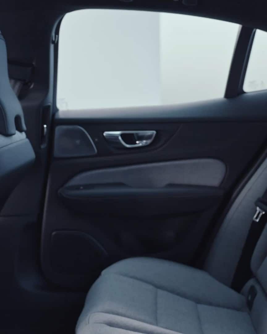 The Volvo S60 plug-in hybrid’s textile upholstered split-folding back passenger seats and rear center console.