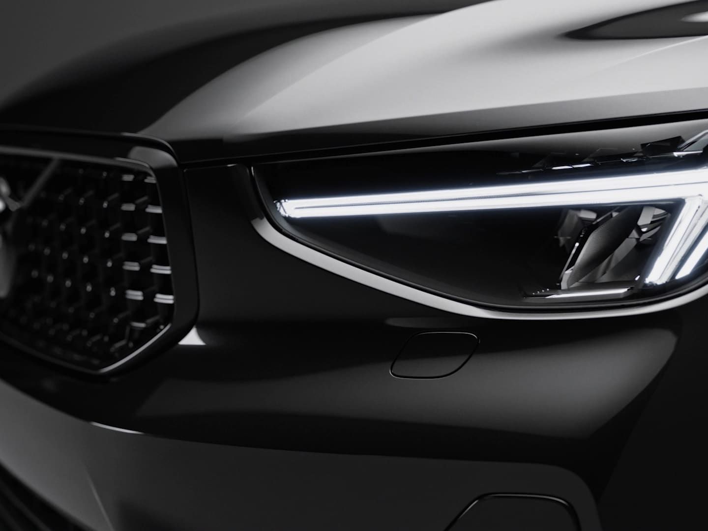 The blacked-out Volvo Iron Mark on the Volvo XC40 Black Edition.