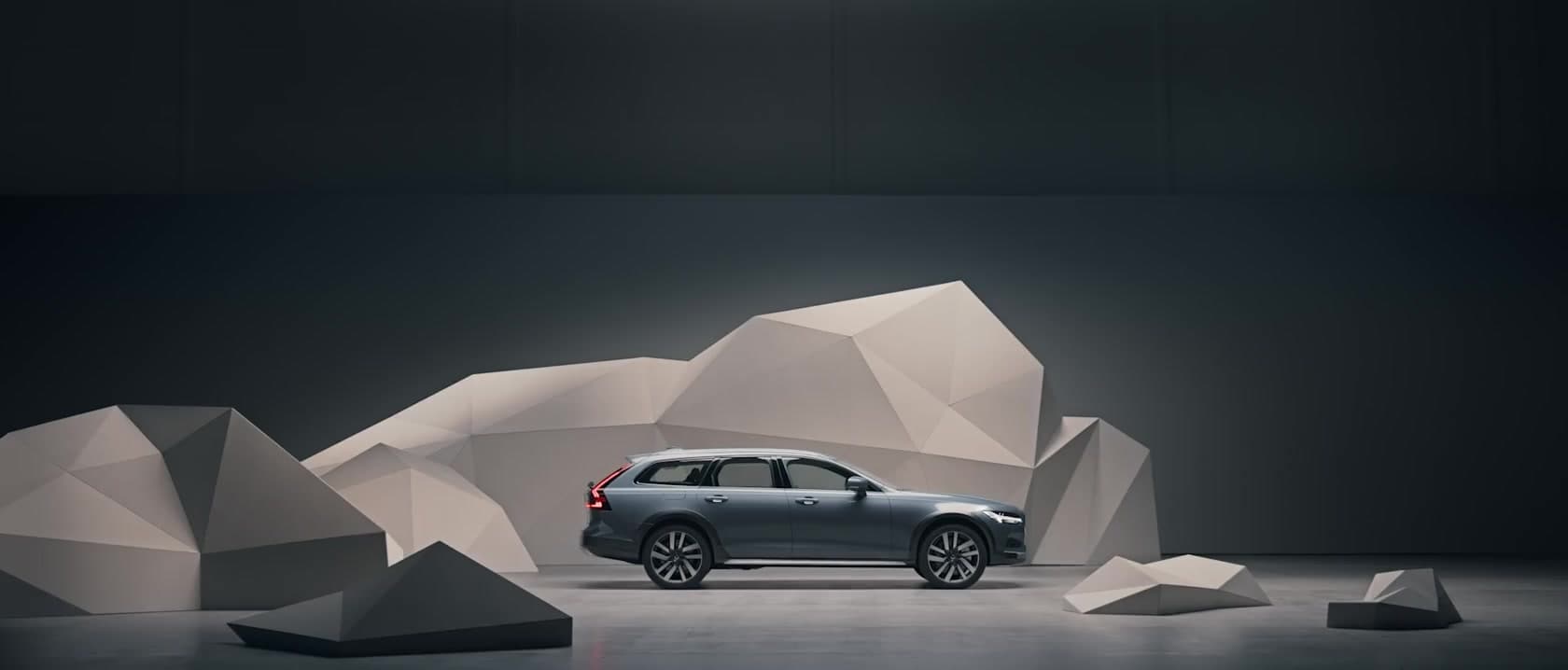 Side exterior of the Volvo V90 Cross Country in Crystal White.