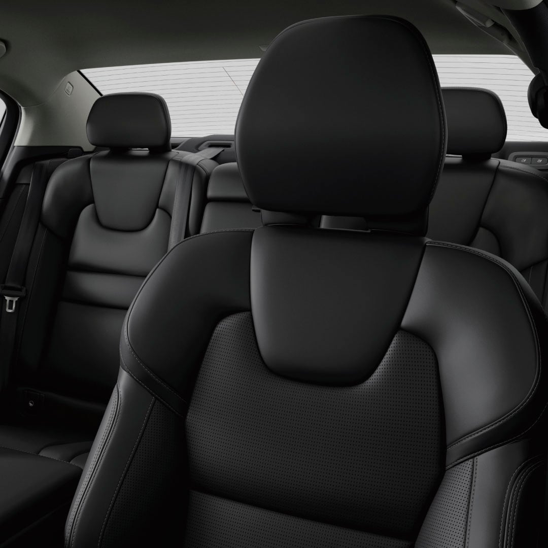 All five dark grey leather and textile seats in the Volvo S60 mild hybrid.