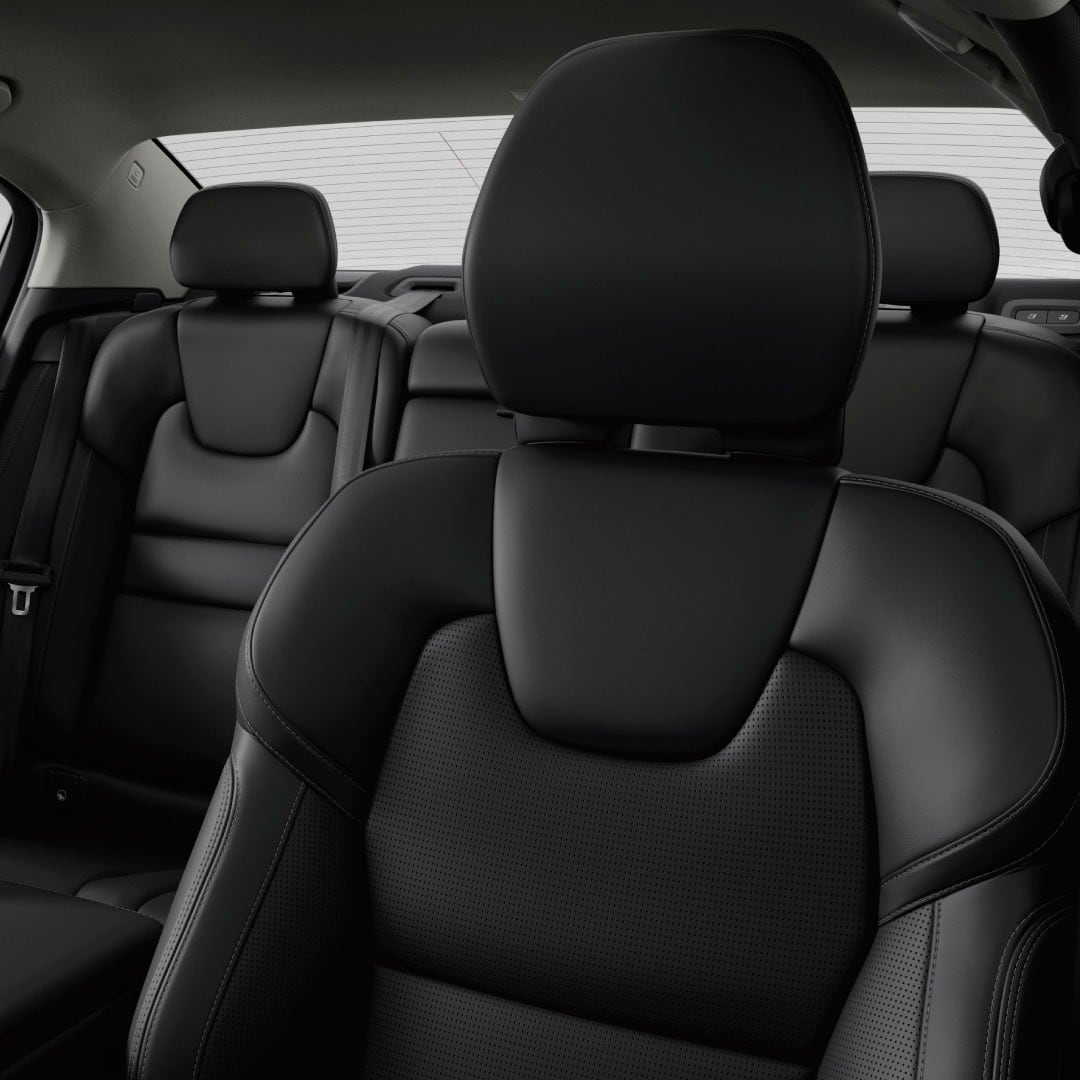 Volvo S60 mild hybrid interior with dark grey leather and textile seats.