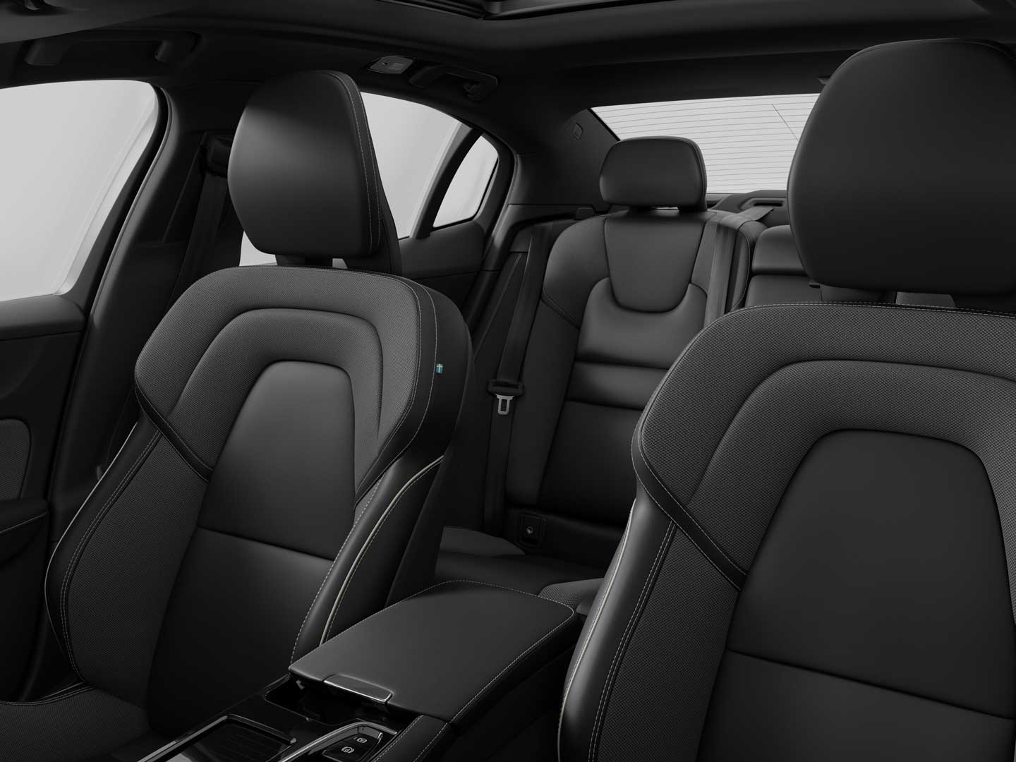Banquette arrière rabattable en deux parties et console centrale de la Volvo S60 hybride branchable.