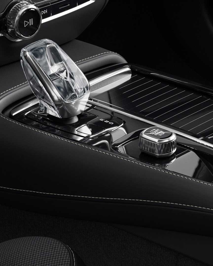 Bouton de démarrage et levier de vitesse dans la console centrale de la Volvo S60 hybride branchable