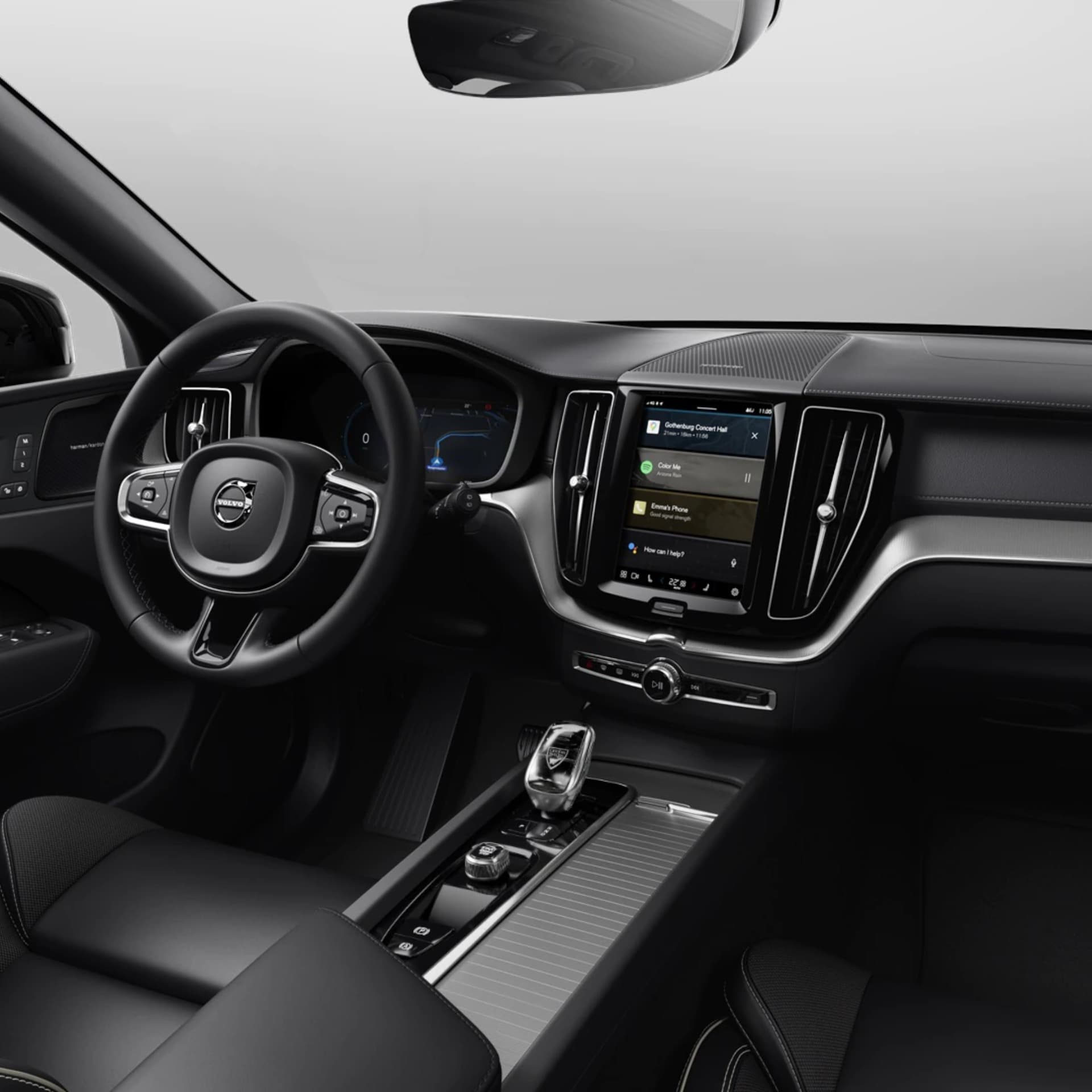 開啟駕駛座車門的 Volvo XC60 前座內裝。