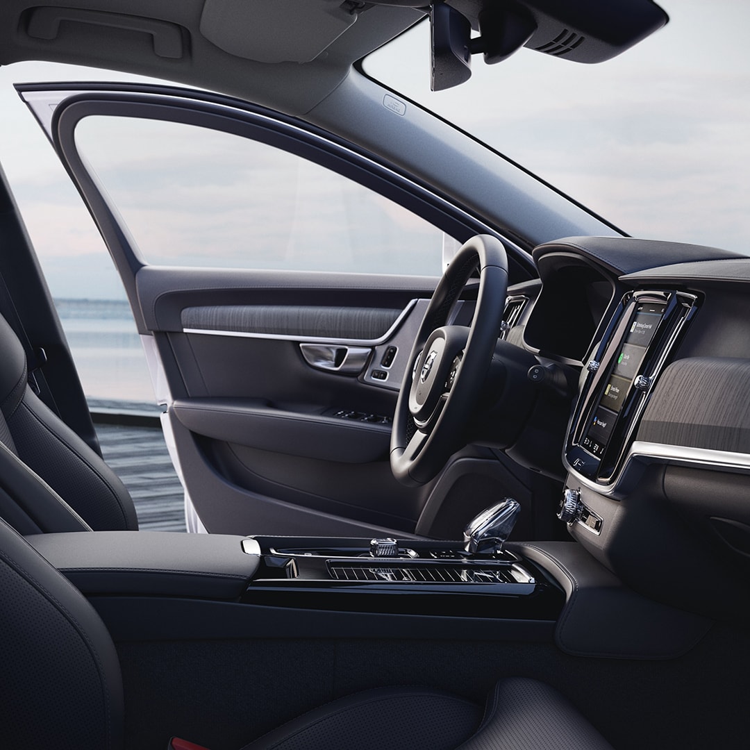 Interior drivers position in Volvo S90 Recharge seen from passenger position.